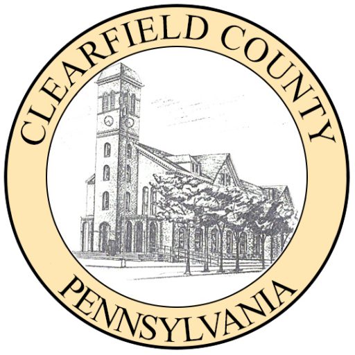 Seal of Clearfield County, Pennsylvania, featuring a sketch of a building with a clock tower and trees.