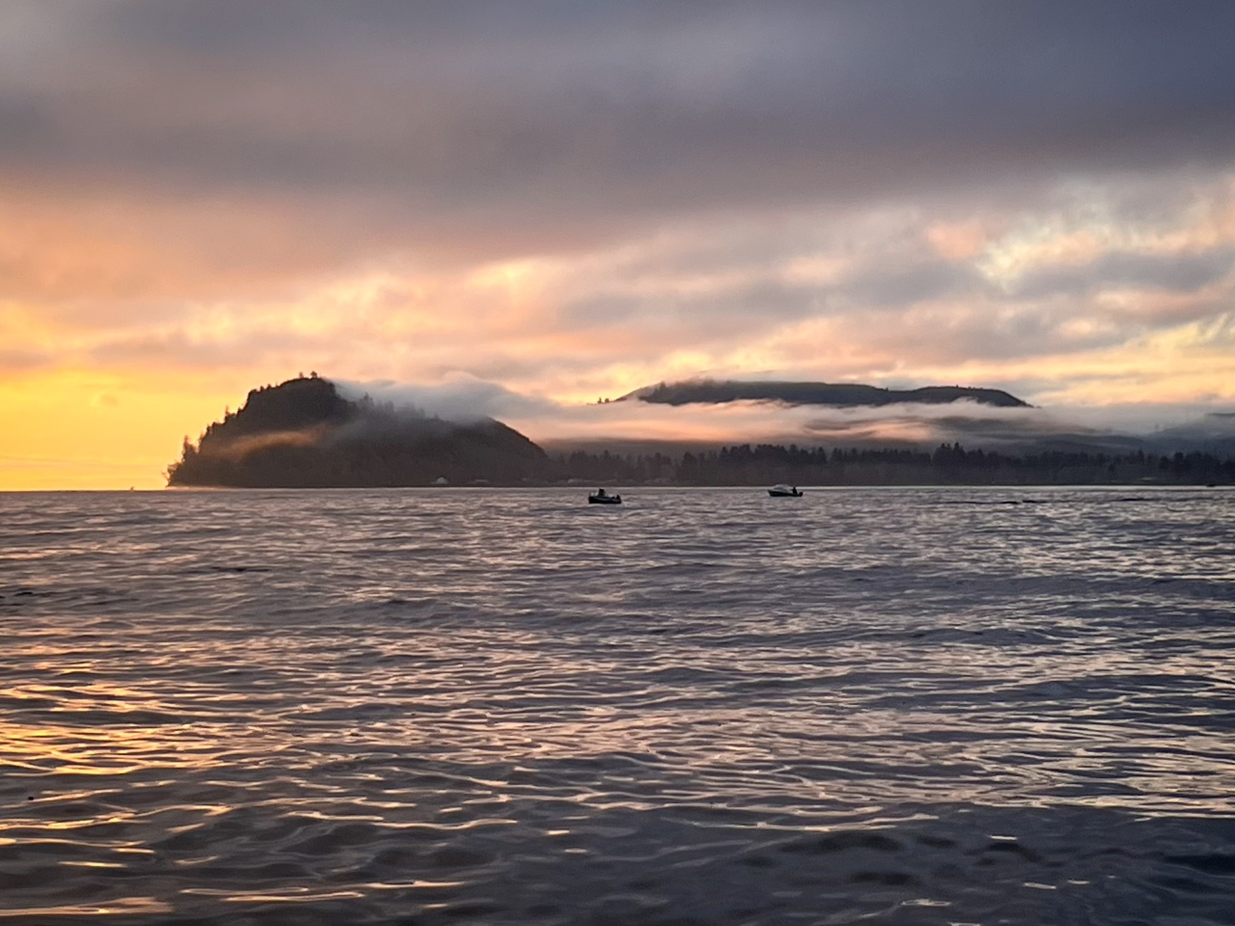2 fishing boats seen on open water