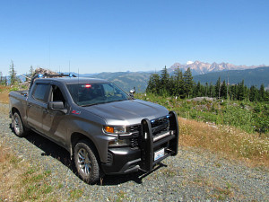 Fish and Wildlife Enforcement Truck on patrol in the backcountry.